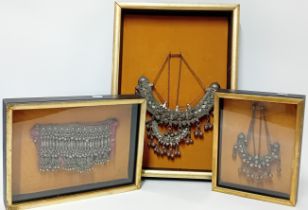 Three cased Ethiopian silver ceremonial wedding necklaces. (3)