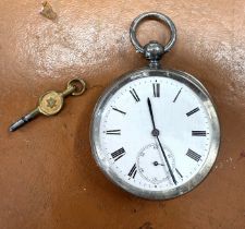 A silver J.W. Benson pocket watch, with Roman numerals, with key.