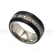 Mojo, a bespoke wedding band ring set with diamonds and three sapphires, size J.