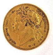 A Geo IV gold sovereign 1824, with laurate head.