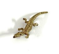 A 9ct yellow gold Crocodile brooch, approx 5.1g.