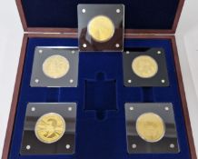 A 'Year of the Three Kings 1936' commemorative gold set of four coins, each weight 1/200oz, together