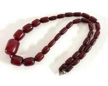 A set of cherry amber bead necklace, length 65cm, approx 69.6g.