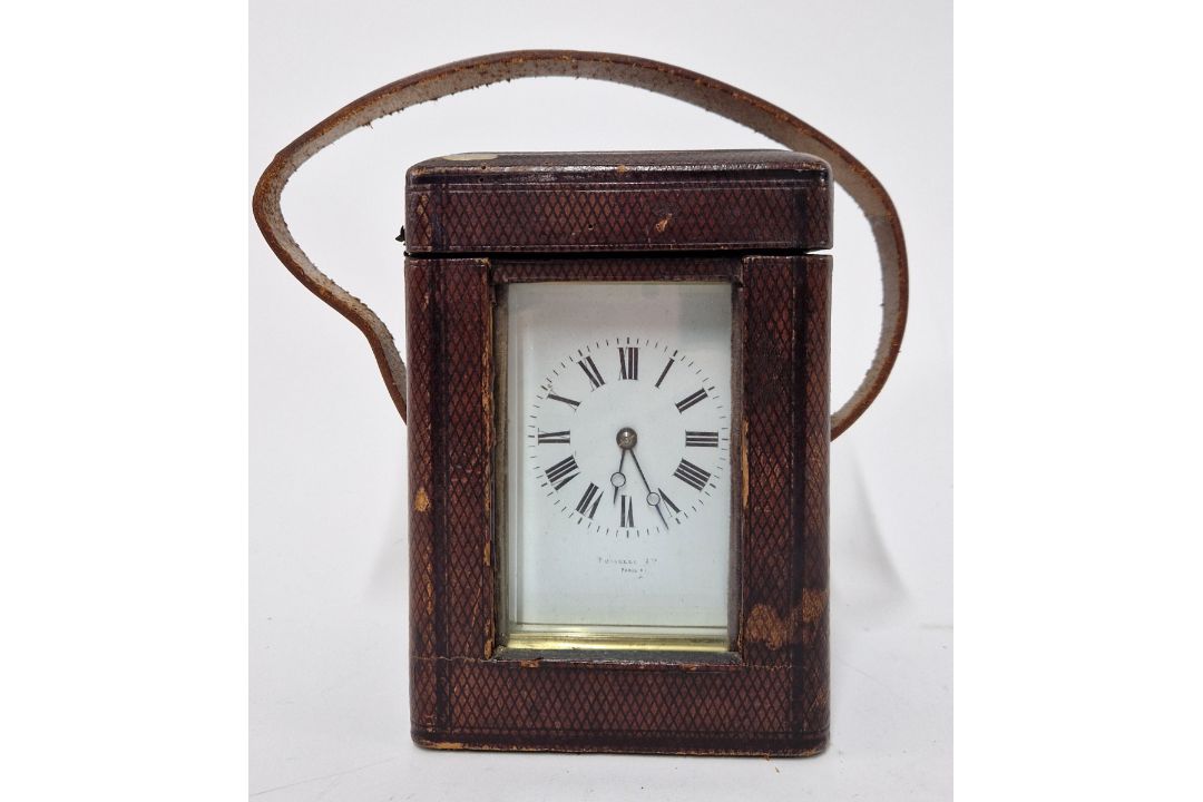 A French carriage clock in leather case with glass front, Roman enamel dial marked Fuselle Ltd, - Image 2 of 2