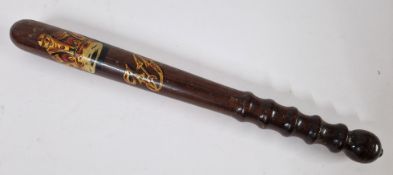A Victorian lignum vitae police truncheon, decorated with gilt painted Victoria cipher and crown,