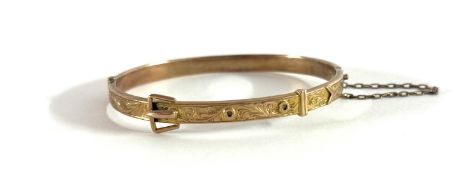 A 9ct gold buckle design bangle, approx 6.5g,