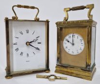 Two brass carriage clocks, to include an early 20th century example with Arabic enamel dial,