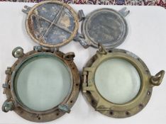 Two cast iron ships port holes with covers, circa 1929. Taken off the Motor Yacht M.Y. Reveler,