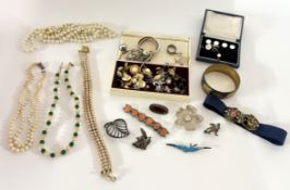 A collection of costume jewellery to include silver brooches, earrings, necklaces etc.