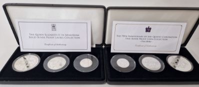 Two sets of Elizabeth II commemorative silver proof coins, to include three 'In Memoriam Laurel