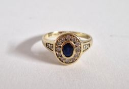 A sapphire and diamond oval shape ring, size L, approx 2.6g.