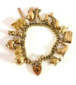 A 9ct yellow gold charm bracelet set with fourteen charms including Duck, Snail, Rat etc, approx