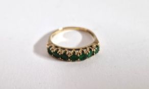 A seven stone emerald ring, set in 9ct yellow gold, size P, approx 2g.