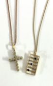 A 9ct gold cross pendant and chain together with a 9ct gold sapphire contemporary style pendant on