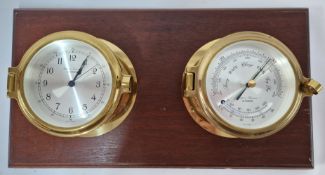 A modern ships clock and barometer by Simpson Laurence, Glasgow, brass cased mounted on wood.