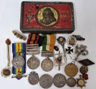 A collection of medals and sweetheart brooches, and other pins etc. To include two South Africa
