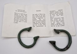A pair of 19th century Manillas or slave tokens, recovered by divers off the wreck of the English