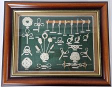 A sailors knot board, framed and glazed, overall size 40cm x 51cm.