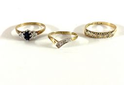 Three 9ct gold dress rings including a sapphire and diamond, approx 4.2g.