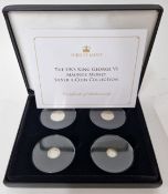 A George VI set of four silver Maundy money coins, to include one penny, two pence, three pence, and