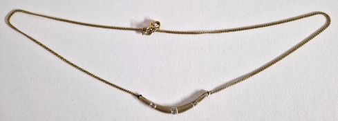 A 9ct yellow gold half crescent/boomerang pendant and chain, approx 3.4g.