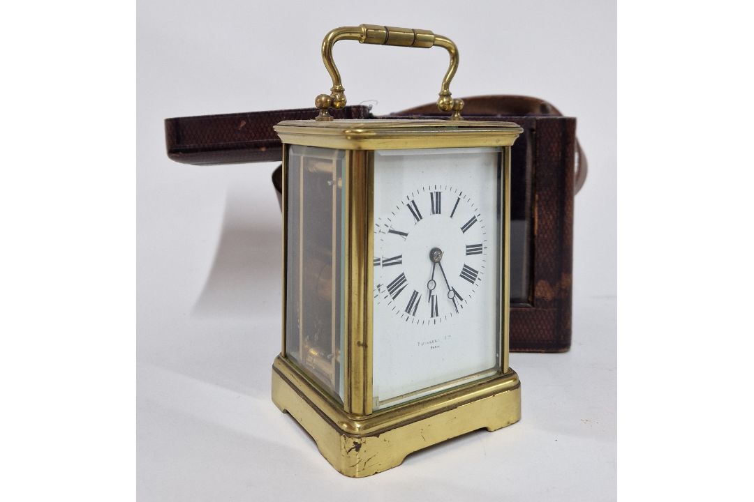 A French carriage clock in leather case with glass front, Roman enamel dial marked Fuselle Ltd, - Image 1 of 2