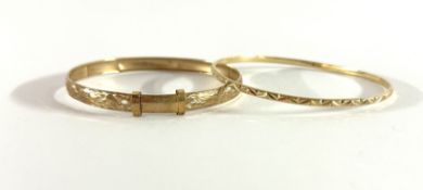 Two 9ct gold bangles, approx 12.9g.