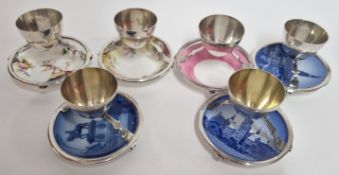 Six silver plated eggcups by Hukin and Heath designed by Dr Christopher Dresser with