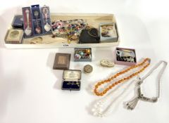 A collection of costume jewellery to include dress rings, brooches, necklaces, souvenir spoons etc.