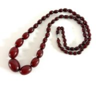 A set of cherry amber bead necklace, length 79cm, approx 61.5g.