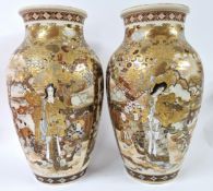 A pair of large Satsuma Earthenware vases, Meiji period (1868-1912), each with the ovoid body