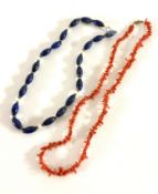 A coral necklace, length approx 55cm together with a lapis lazuli style necklace, length approx 44cm