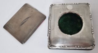 A silver cigarette case, hallmarked London 1928, weight approx 4.25oz, together with a silver and