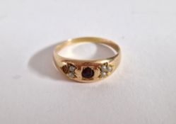 A 15ct gold ruby and seed pearl ring, size T, approx 3.5g (one seed pearl missing).