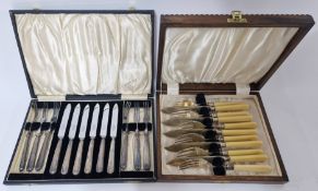A silver handled stainless steel dessert service. Hallmarked Sheffield 1930, together with a silver