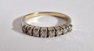 An eight stone diamond ring, set in 18k yellow gold, size Q, approx 3.1g.