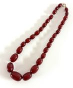 A set of small cherry amber bead necklace with a 9ct gold clasp, length 43cm, approx 34g.