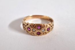 A 9ct gold ruby and diamond set ring, size T/U, approx 3.1g.