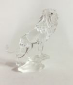 Swarovski Crystal Glass, Lion Standing on a Rock, boxed.