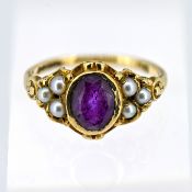 An amethyst and seed pearl set ring, set in 9ct yellow gold, size I/J, approx 2.7g.