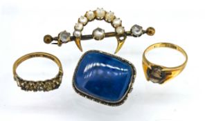 A half crescent brooch set with moonstones, a 9ct gold quartz ring, another brooch and 9ct dress