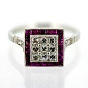 A good ruby and diamond 'square' shape ring, pave set, with 9 x cushion old cut diamonds with ruby