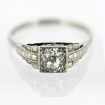 An Edwardian diamond single stone ring, (old mine cut stone) set in platinum, approx 0.75ct, size
