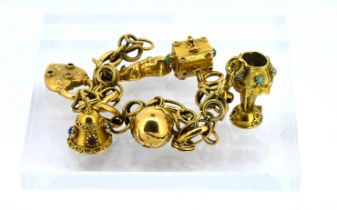 An 18ct yellow gold charm bracelet, set with six charms, total weight approx 43.4g.