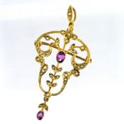 A pearl pendant/brooch set with a purple coloured stone, set in 9ct yellow gold, approx 3.5g.
