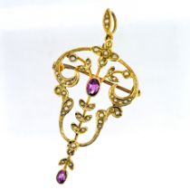 A pearl pendant/brooch set with a purple coloured stone, set in 9ct yellow gold, approx 3.5g.