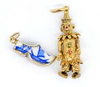 A 9ct gold articulated 'Clown' charm, approx 5.4g together with an enamel clog charm (2).