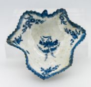 A Worcester pickle dish of leaf form, serrated edges, with floral motifs.