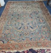 A patterned rug, approx size 270cm x 375cm.