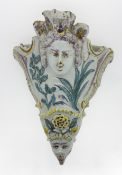 A 19th century Delftware style single wall pocket, height approx 20cm.